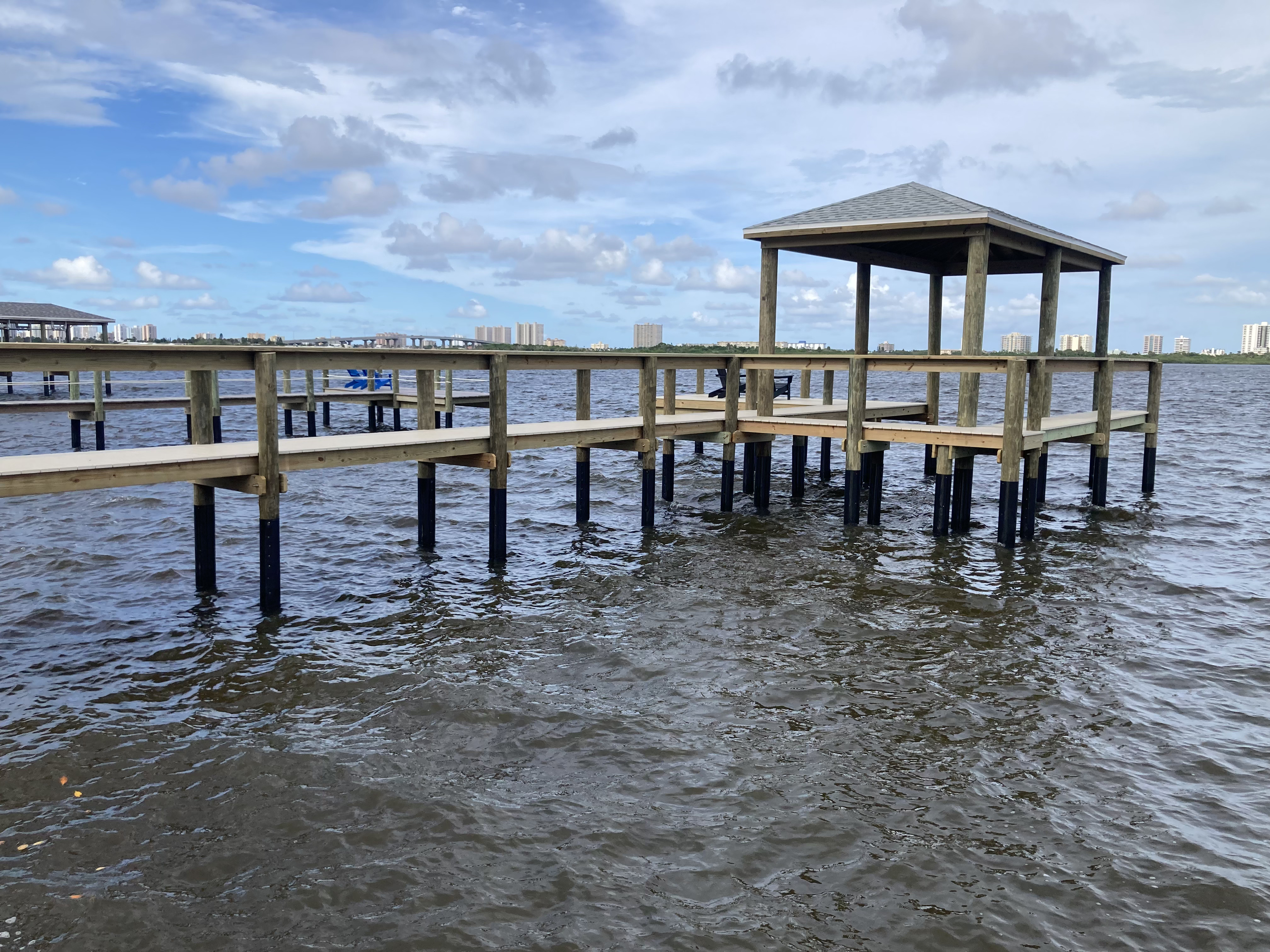 Completed custom dock with covered structure over Florida water